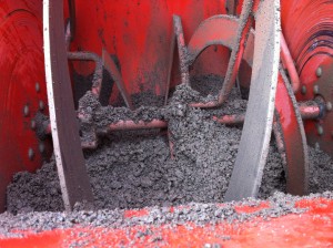 Notice how well a Mortar Mixer with spiral blades mixes aggregates and sand. Much better than a rotary drum mixer.