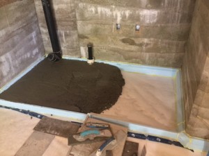 This storage room is halfway in between. Essentially, I dumped two or three wheel barrows of cement that smoothed it up. This size of pad was easy at 28 sq. ft. But over 60 sq. ft. was tough. Cement on the first pour was drying before the last pour. Tricky getting it smooth.